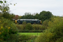 An English Electric Class 40 'Whistler' slips through a clearing between Arley and Highley